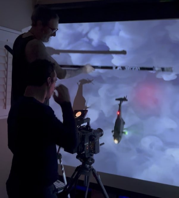 Shooting a projected element in camera
